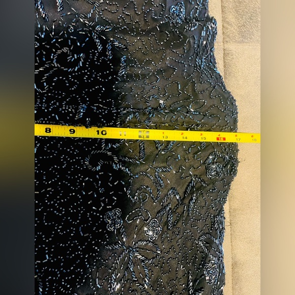 A gorgeous mid length beaded dress by Scala. - Picture 11 of 11